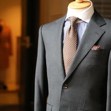 A grey suit in a warm ambiente